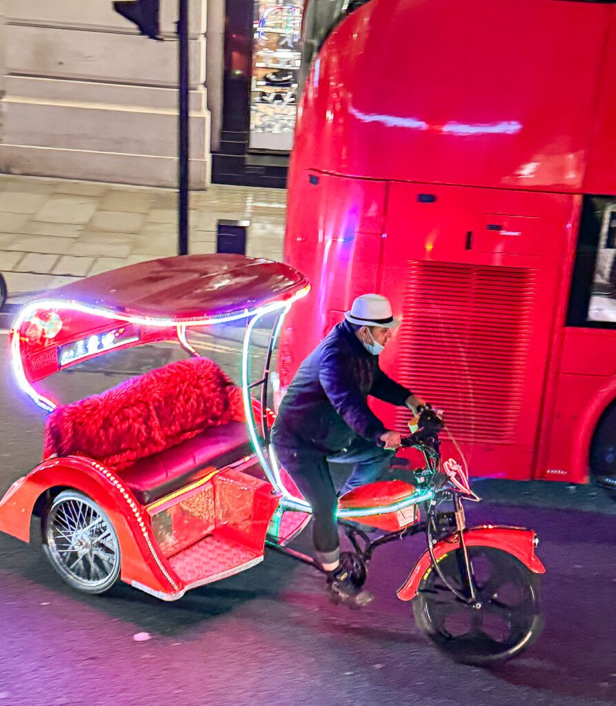 Rikscha Fahrer in London